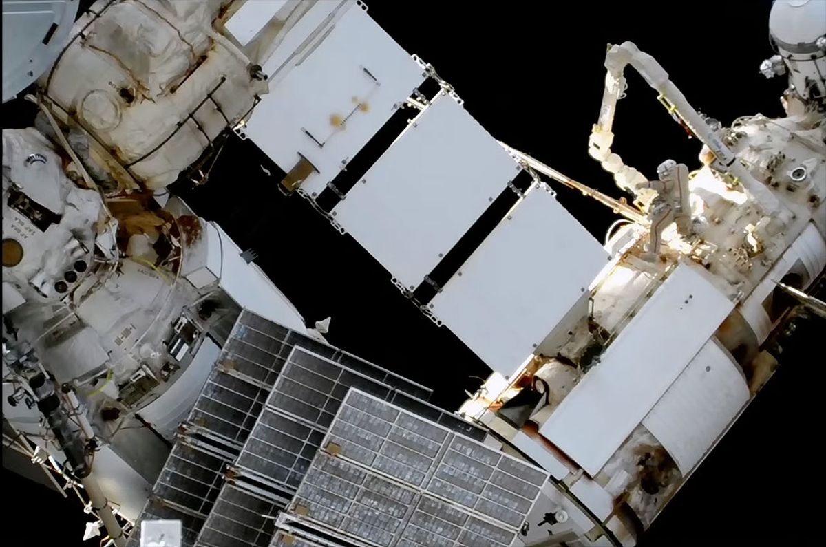 Russian cosmonaut Sergey Prokopyev floats outside of the Nauka module, the European Robotic Arm (ERA) and Nauka&#039;s newly-deployed radiator during a spacewalk at the International Space Station on Friday, May 12, 2023.