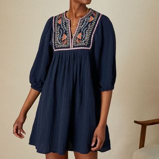 smock dress in navy with bib embroidery