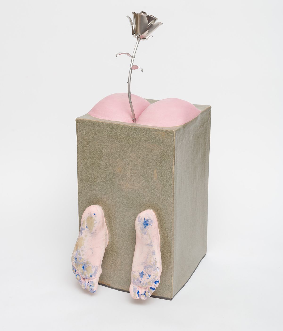 Sculpture of buttocks with rose protruding