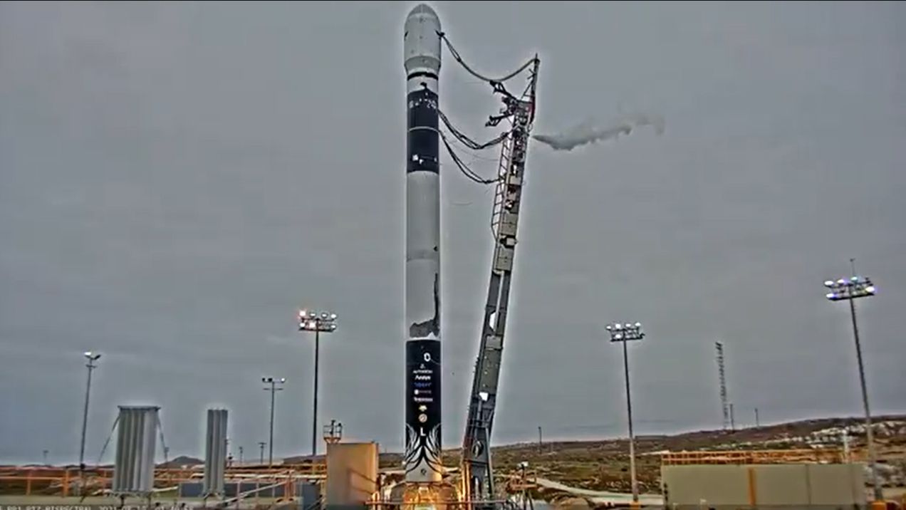 A Firefly Aerospace Alpha rocket fires up its first stage in a 15-second static-fire test on a Vandenberg Space Force Base launchpad on Aug. 18, 2021.