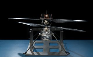This image of the flight model of NASA's Mars Helicopter was taken on Feb. 14, 2019, in a cleanroom at NASA's Jet Propulsion Laboratory in Pasadena, California.