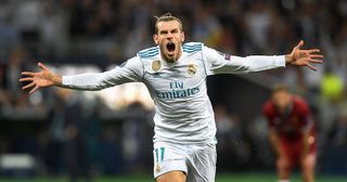 Gareth Bale of Real Madrid celebrates scoring his side's second goal during the UEFA Champions League Final between Real Madrid and Liverpool at NSC Olimpiyskiy Stadium on May 26, 2018 in Kiev, Ukraine.