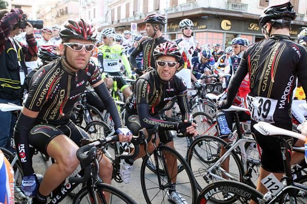 Carmiooro NGC team members await the start of stage three.