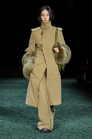 Burberry runway look featuring funnel-neck outerwear.