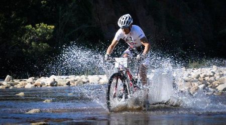 World champion Christoph Sauser crosses the Brak River
