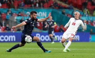 Phil Foden takes a shot