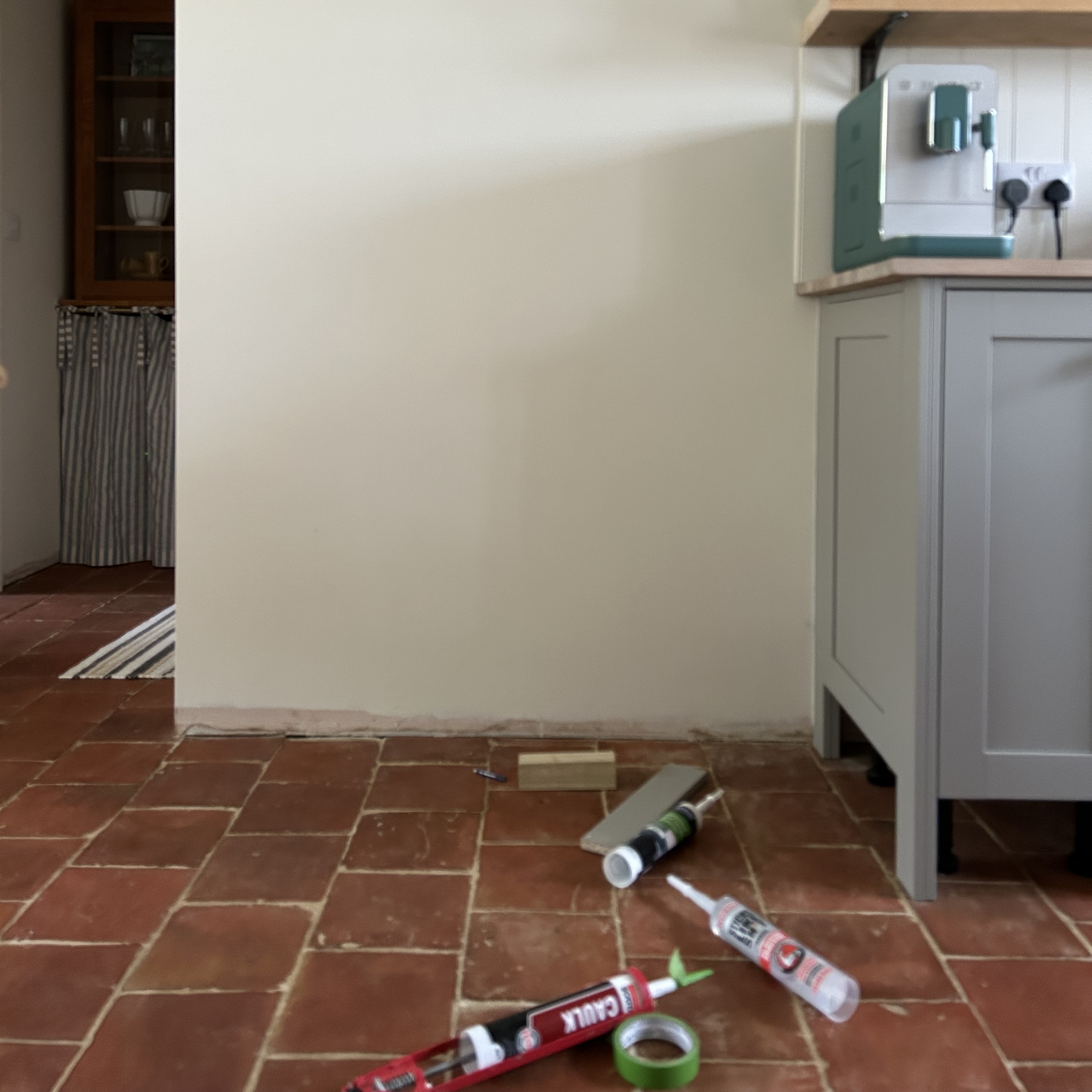 kitchen with diy tools on the floor