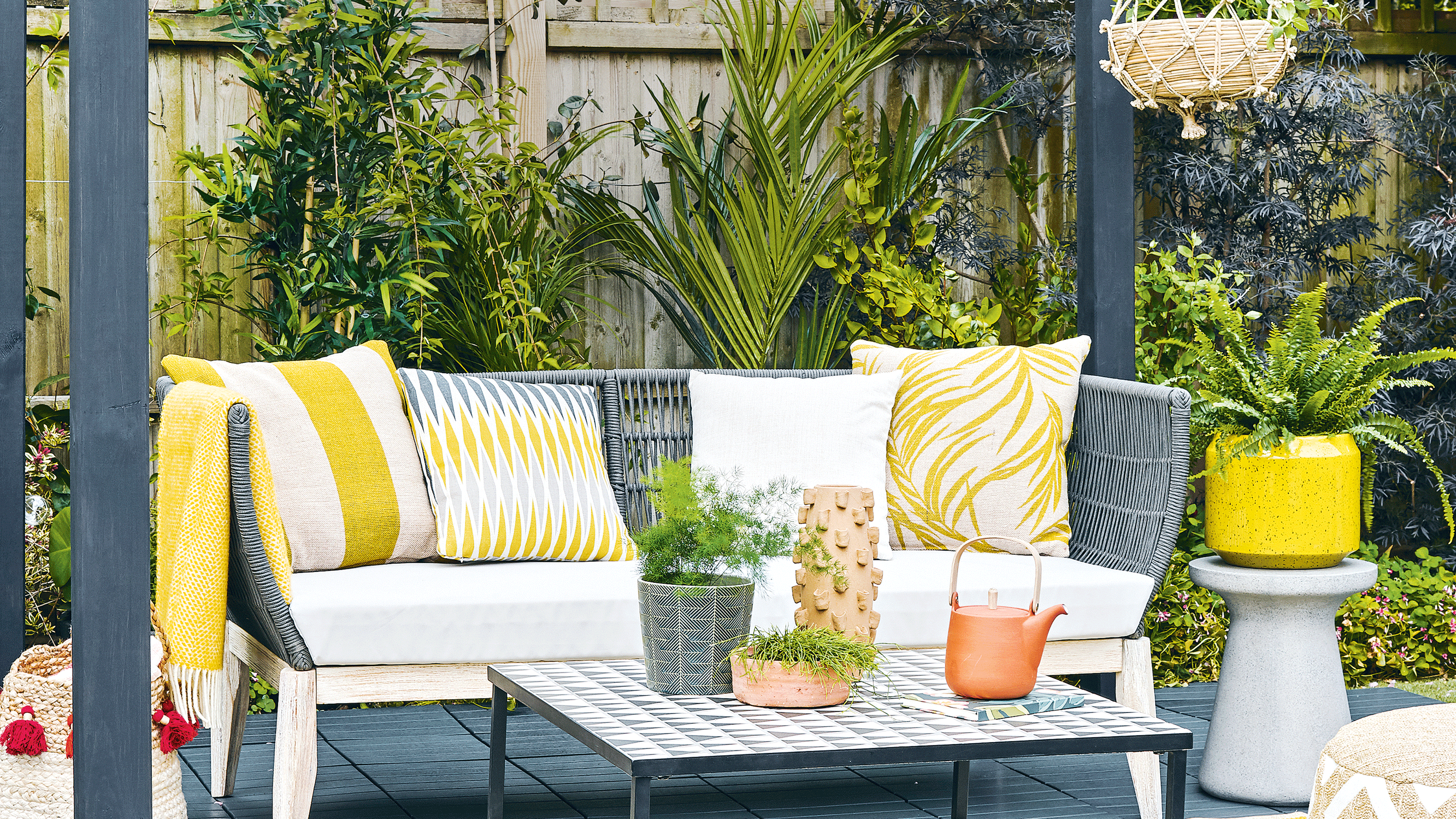 Wooden outdoor sofa with outdoor cushions