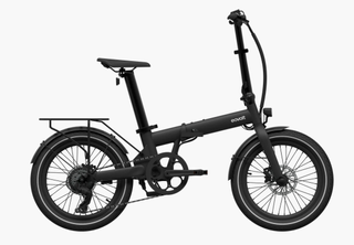 Slim and simply designed black folding bike with pannier rack on the back