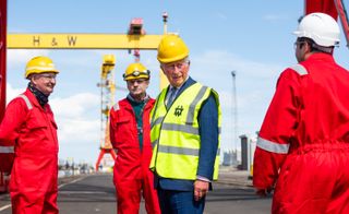 Prince Charles, Prince of Wales visits the Harland & Wolff shipyard on May 18, 2021 in Belfast, Northern Ireland. His Royal Highness celebrates the shipyard's 160th anniversary as part of the long history of commercial shipbuilding in Belfast. (Photo by Samir Hussein - Pool / Getty Images)