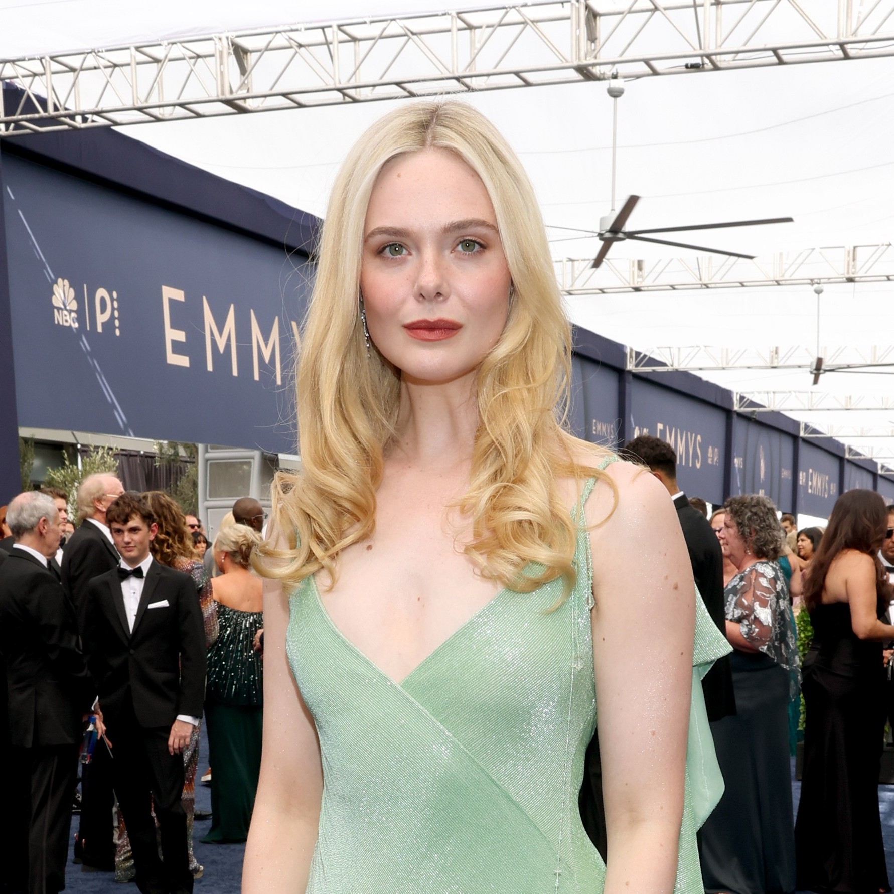 elle fanning wears shimmery sage gown to 2026 emmy awards