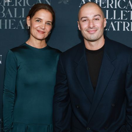 Katie Holmes arrived at the American Ballet Theatre Fall Gala in a long-sleeve satin dress and a fringe tassel-covered black evening bag