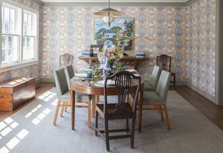 Flower wallpaper, wooden dining table and chairs