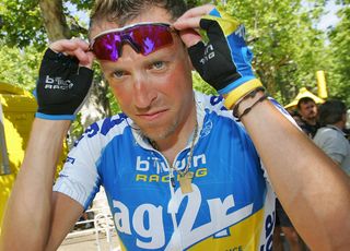 Montelimar FRANCE Frances Christophe Moreau AG2RFra puts his sun glasses on during the 1805 km fourteenth stage of the 93rd Tour de France cycling race from Montelimar to Gap 16 July 2006 AFP PHOTO PASCAL GUYOT Photo credit should read PASCAL GUYOTAFP via Getty Images
