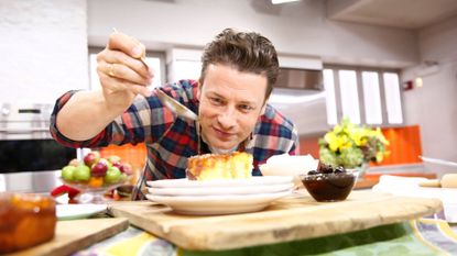 Jamie Oliver cooking and prepping a dish