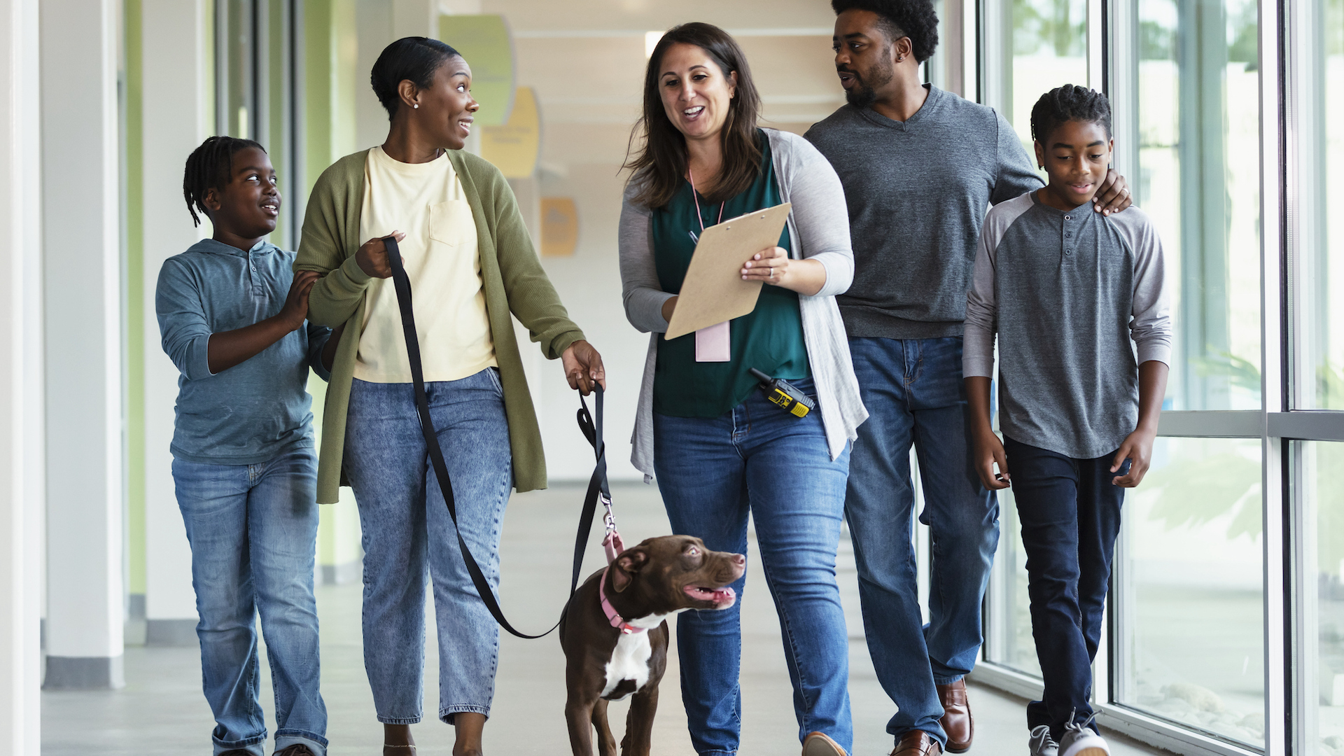 Family adopting dog from shelter