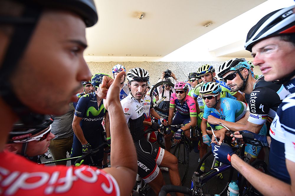 Riders surround Fabian Cancellara (Trek Factory Racing) to talk about stage 5 dangers
