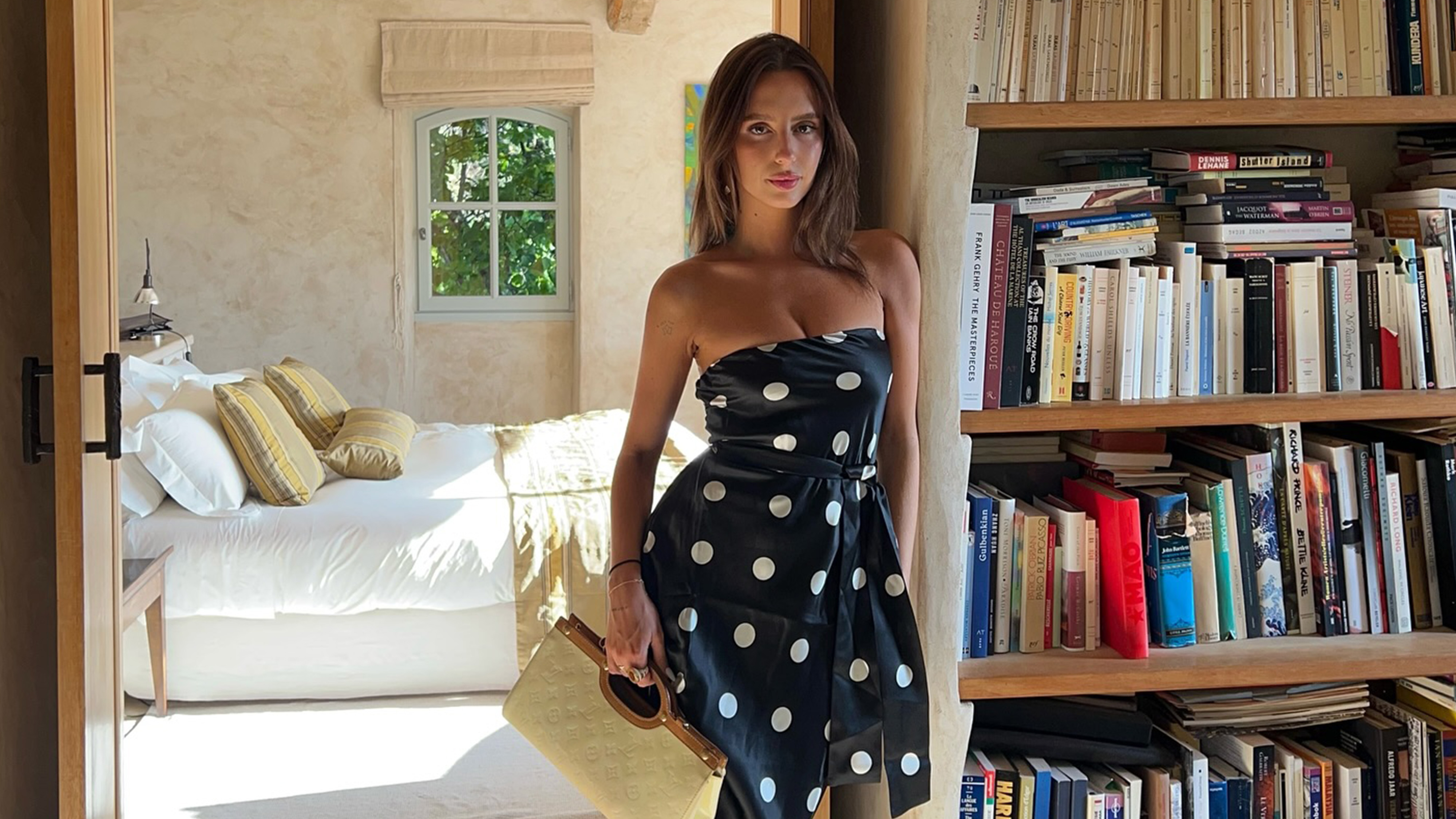 woman wearing polka dot dress for a spring baby shower