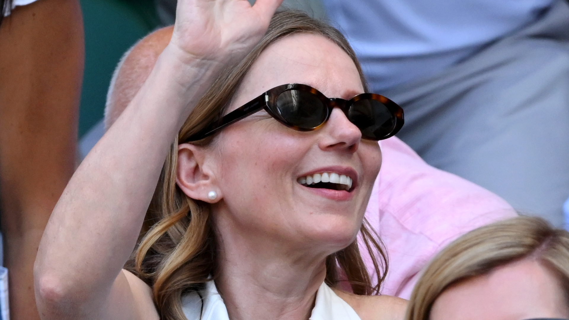 Image of Geri Halliwell Horner at Wimbledon waving 