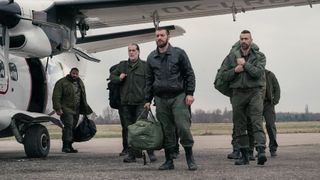 Vakhtang, Sergo, Zurab and Konstantine leaving a plane in Extraction 2