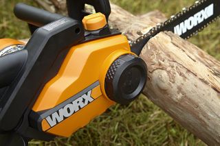 WORX electric chainsaw cutting wood