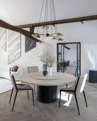Sculptural pendant light over a dining table