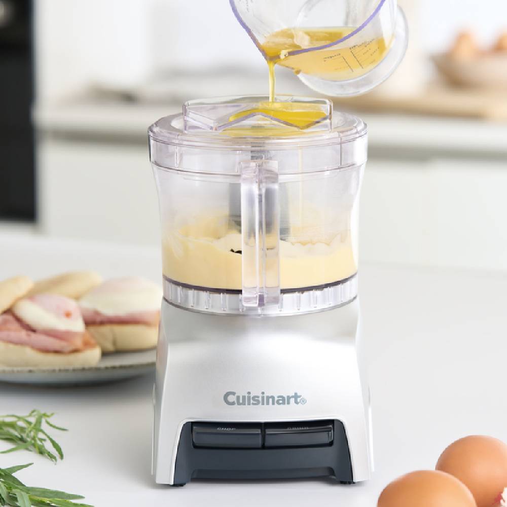 A Cuisinart blender on a modern kitchen side.
