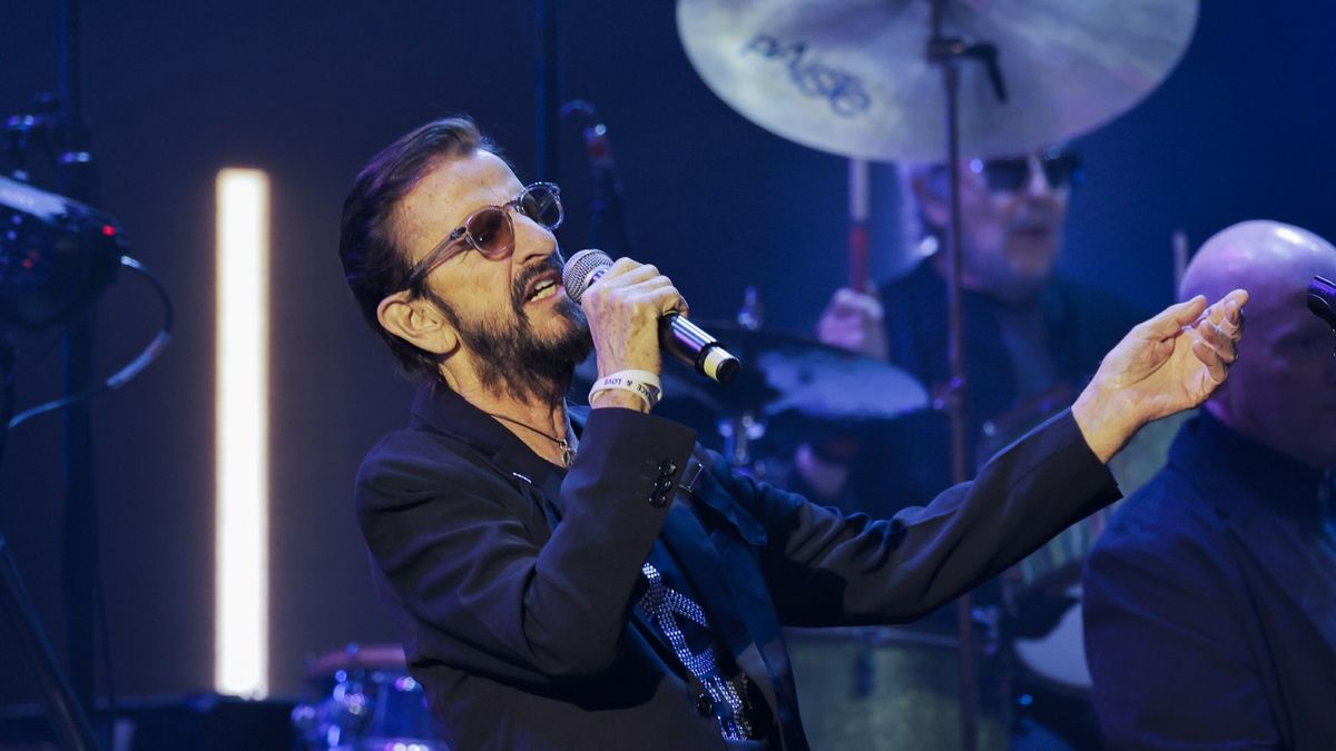 Ringo Starr performing on stage