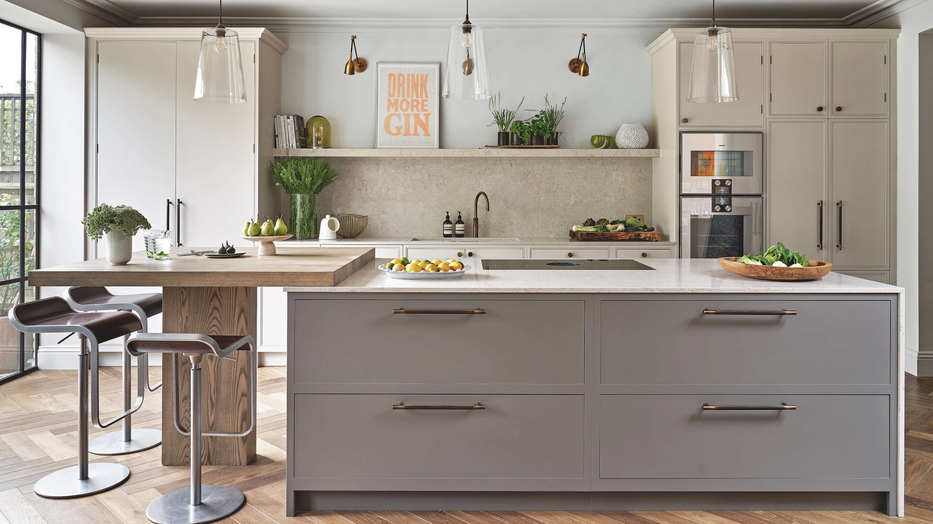 kitchen with grey shaker units and large island with seating area
