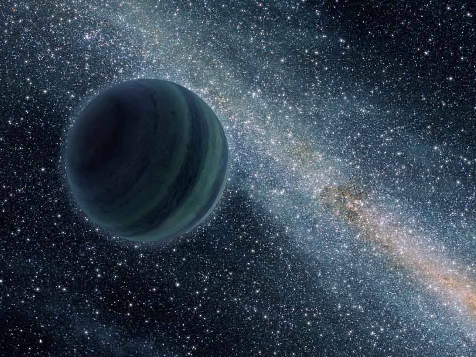 This artist's conception illustrates a giant planet floating freely without a parent star. Astronomers recently uncovered evidence for such lone worlds, thought to have been booted from developing star systems. The sun may have captured such a planet, which new work shows may reside at the edge of the solar system.