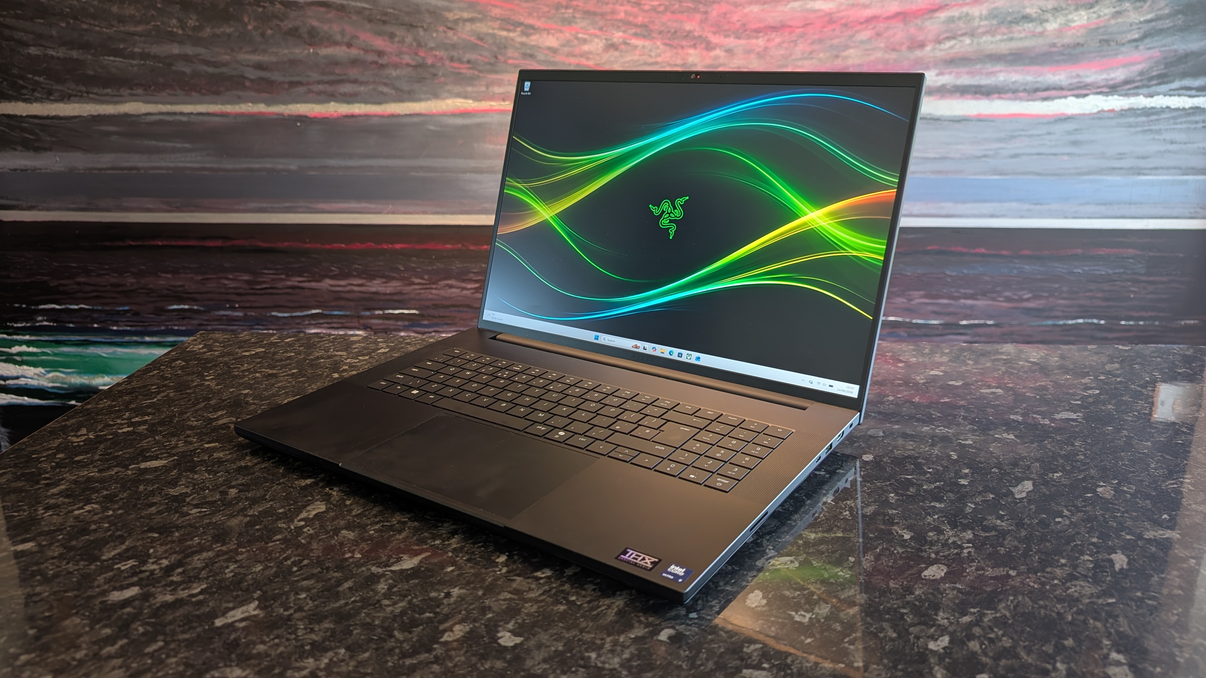The Razer Blade 18 (2026) pictured on a black marble worktop.