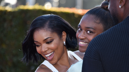 US actress Gabrielle Union and her daughter Zaya Wade arrive for the "Cheaper by the Dozen" Disney premiere at the El Capitan theatre in Hollywood, California, March 16, 2022.