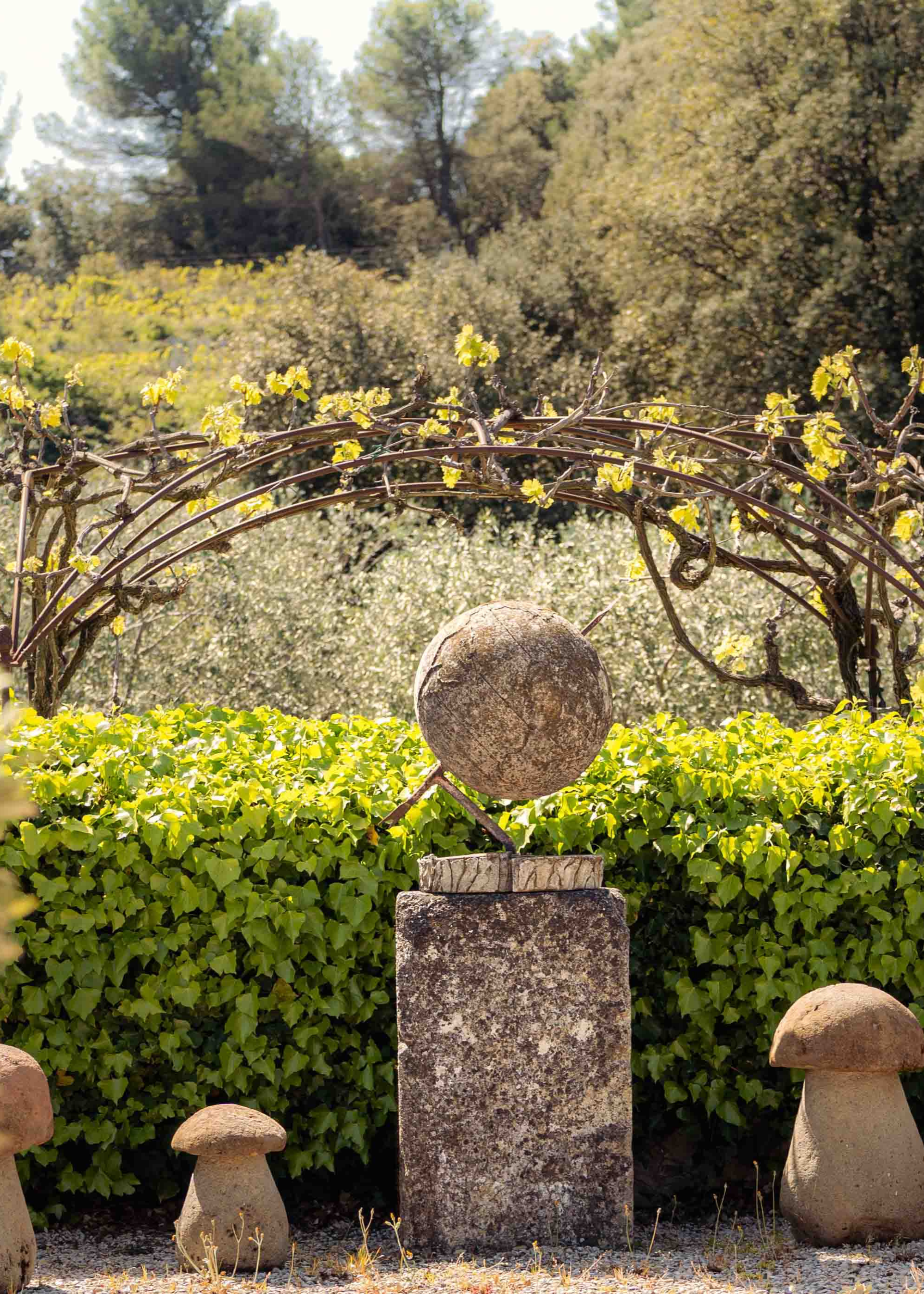 An antique sculpture in a garden