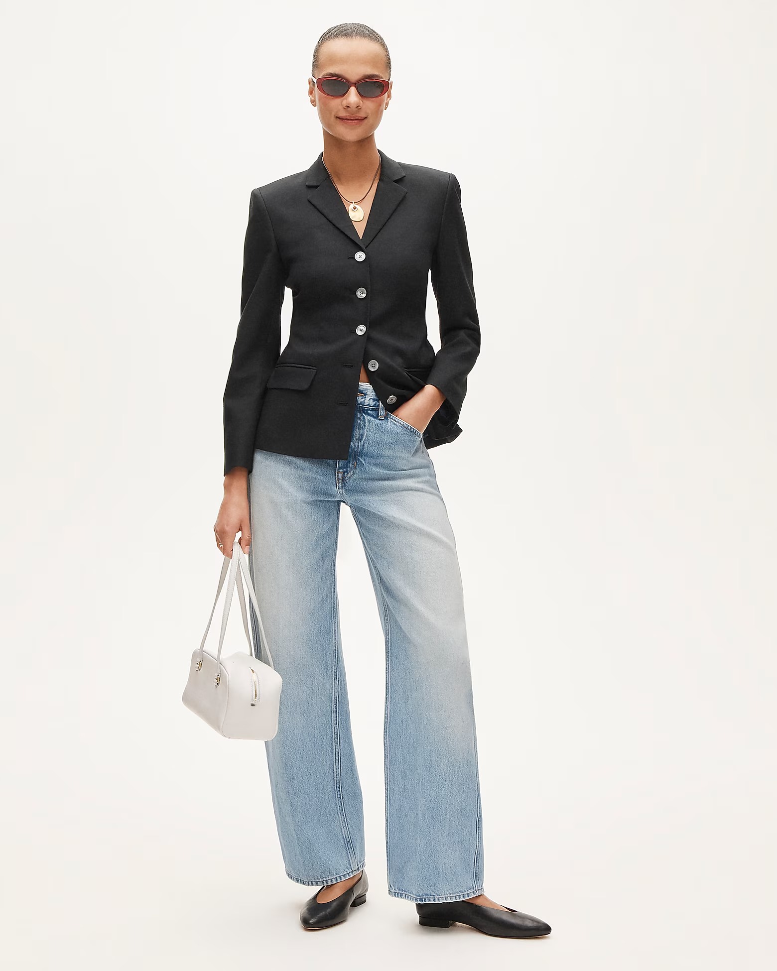 J.Crew outfit with a black blazer, pendant necklace, jeans, white shoulder bag, and black almond-toe ballet flats