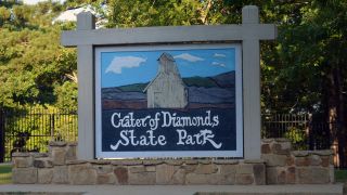 Crater of Diamons State Park entrance sign