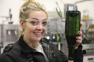Cherry Healey with a bottle