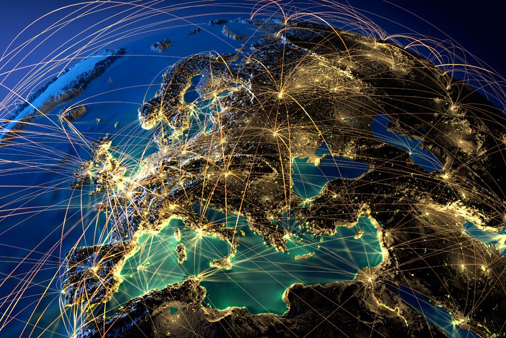 Europe and middle east map at night lit up with data lines