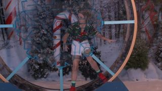 Britney Haynes on a spinning wheel in Big Brother: Reindeer Games