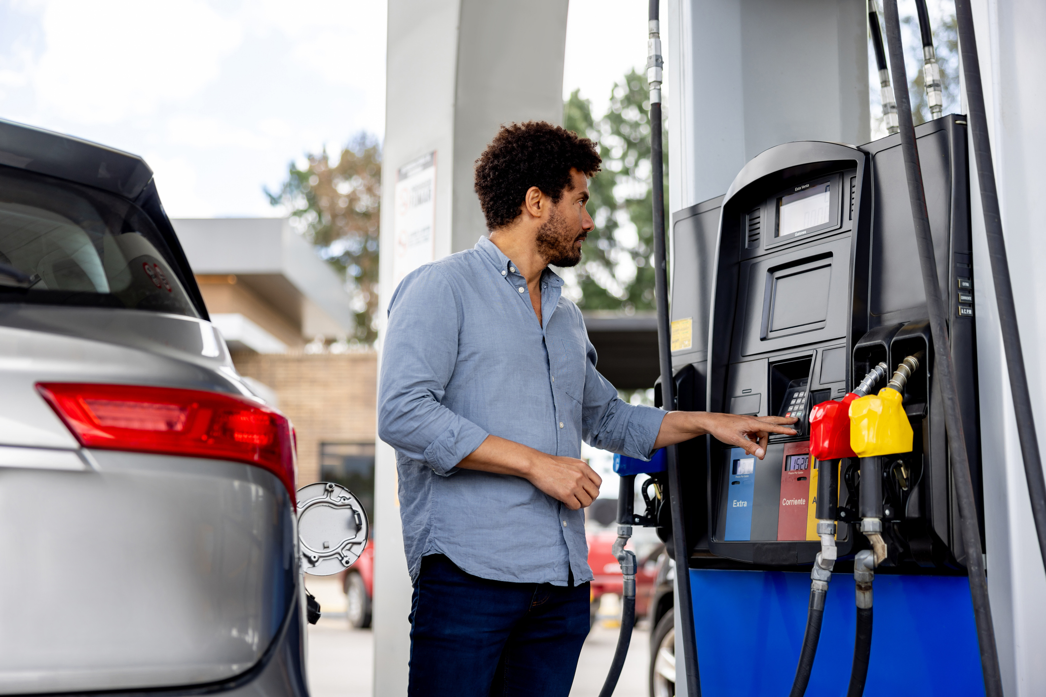 Man at a fuel pump