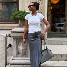 woman wearing white t-shirt and long silk skirt summer 2025