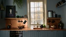 deVOL Kitchen with copper countertops and blue cabinets