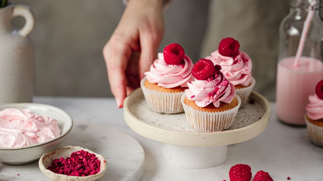 Raspberry muffins on a presentation tray.