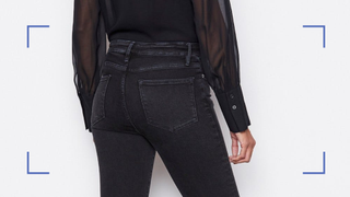 Close up of Frame jeans being worn by a model, close up details of the back pocket and yoke