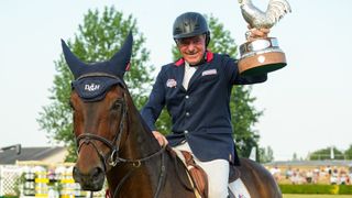 John Whitaker with the Cock O'the North trophy