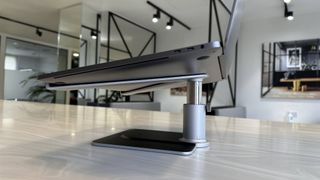 Twelve South HiRise Pro MacBook stand on a marble surface in an office