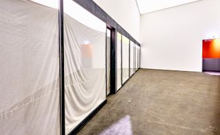 Installation view of Three Store Fronts, 1965-66, by Christo at BRAFA, Brussels.