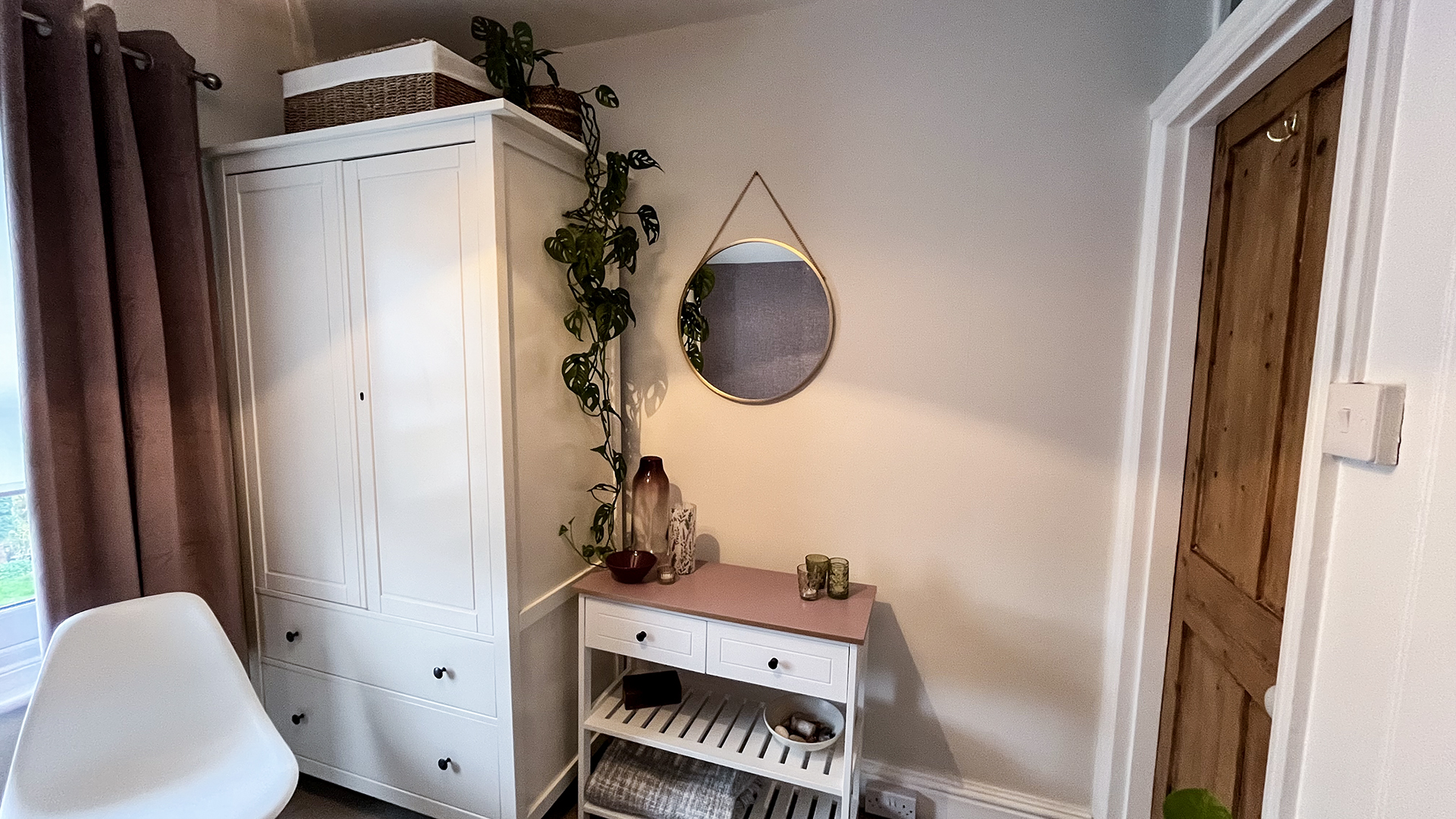 wardrobe and dressing table in a small bedroom