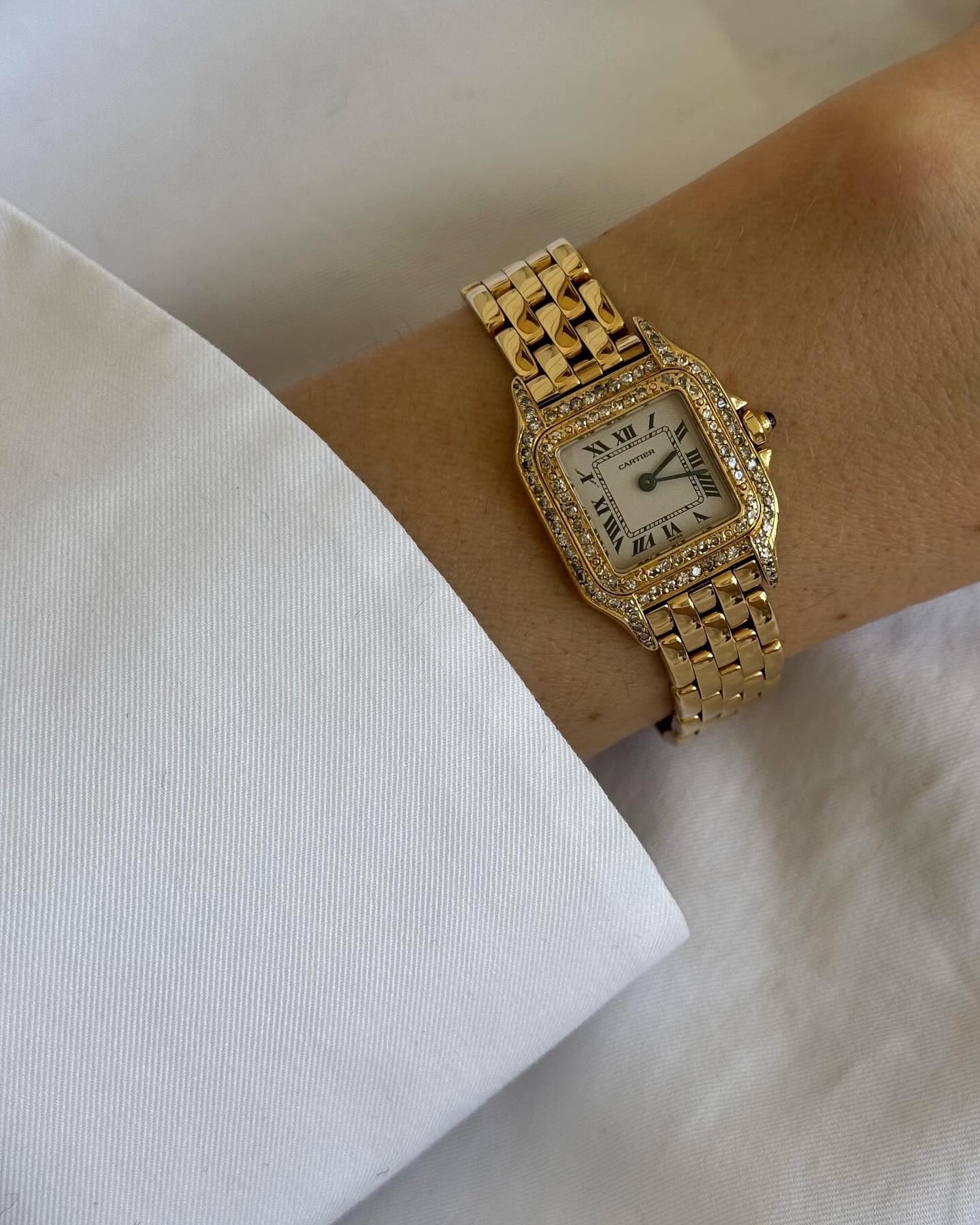 An image of @rikkekrefting wearing a vintage Cartier Panth&amp;egrave;re, one of the biggest watch trends for 2026.