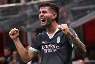 Christian Pulisic celebrates after scoring for AC Milan against Club Brugge in the Champions League in October 2024.