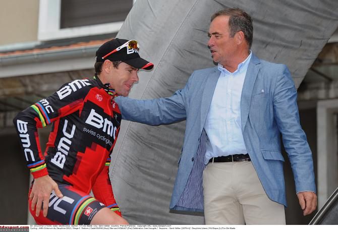 Bernard Hinault also greets riders on the podium in the Dauphin&eacute;